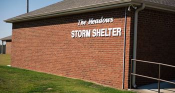 Storm shelter with tv and bathroom